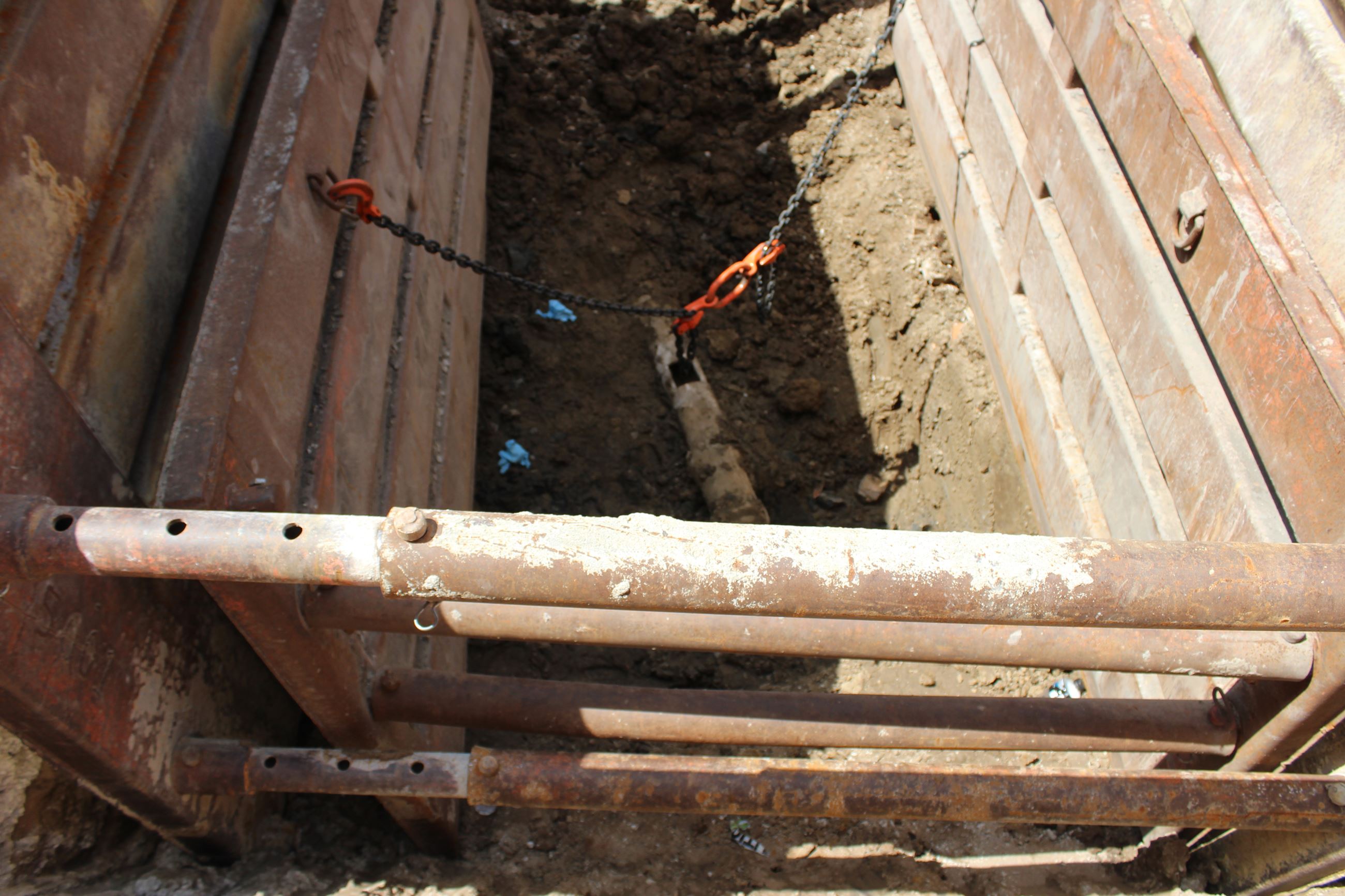 2nd Street Sewer Repair - line exposed in trench 2 - 072219 (JPG)