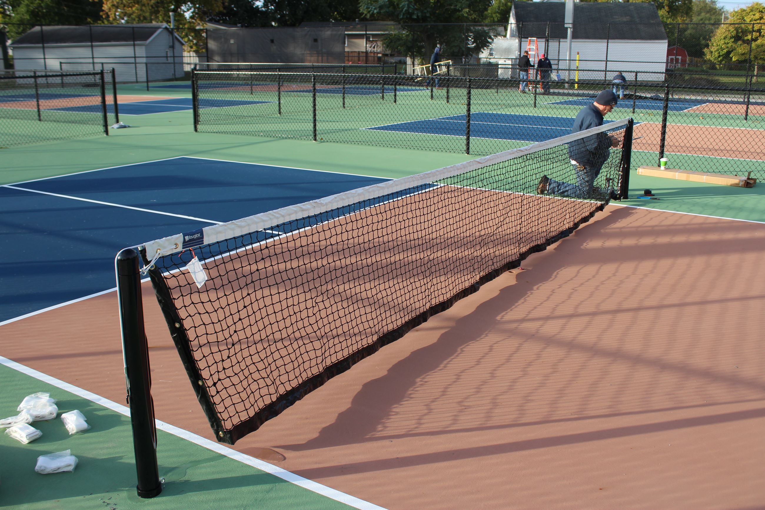taylor Park PIckleball Court putting up the nets (JPG)