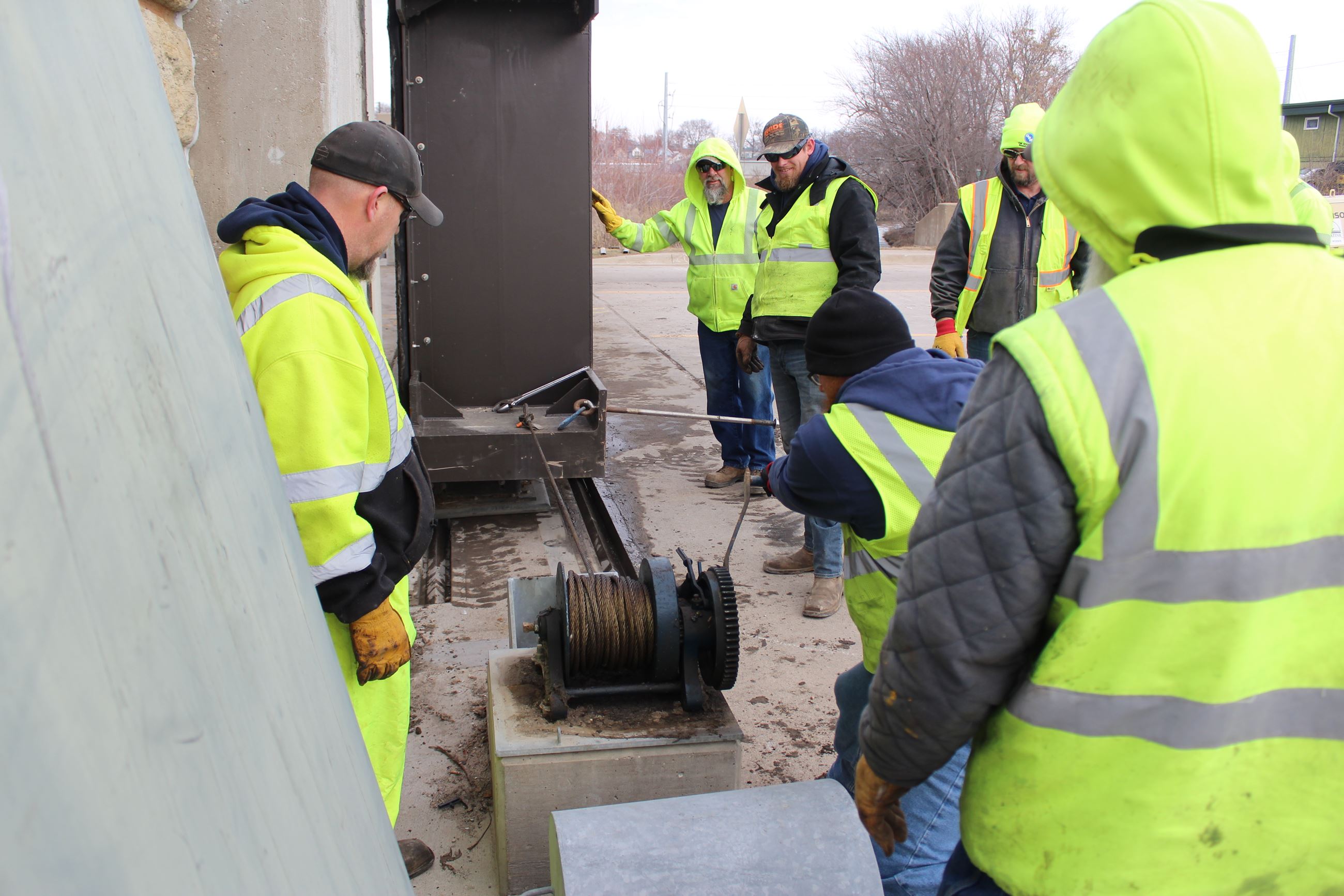 Floodgate Exercise - Hand cranking the gate closed (JPG) 031523 