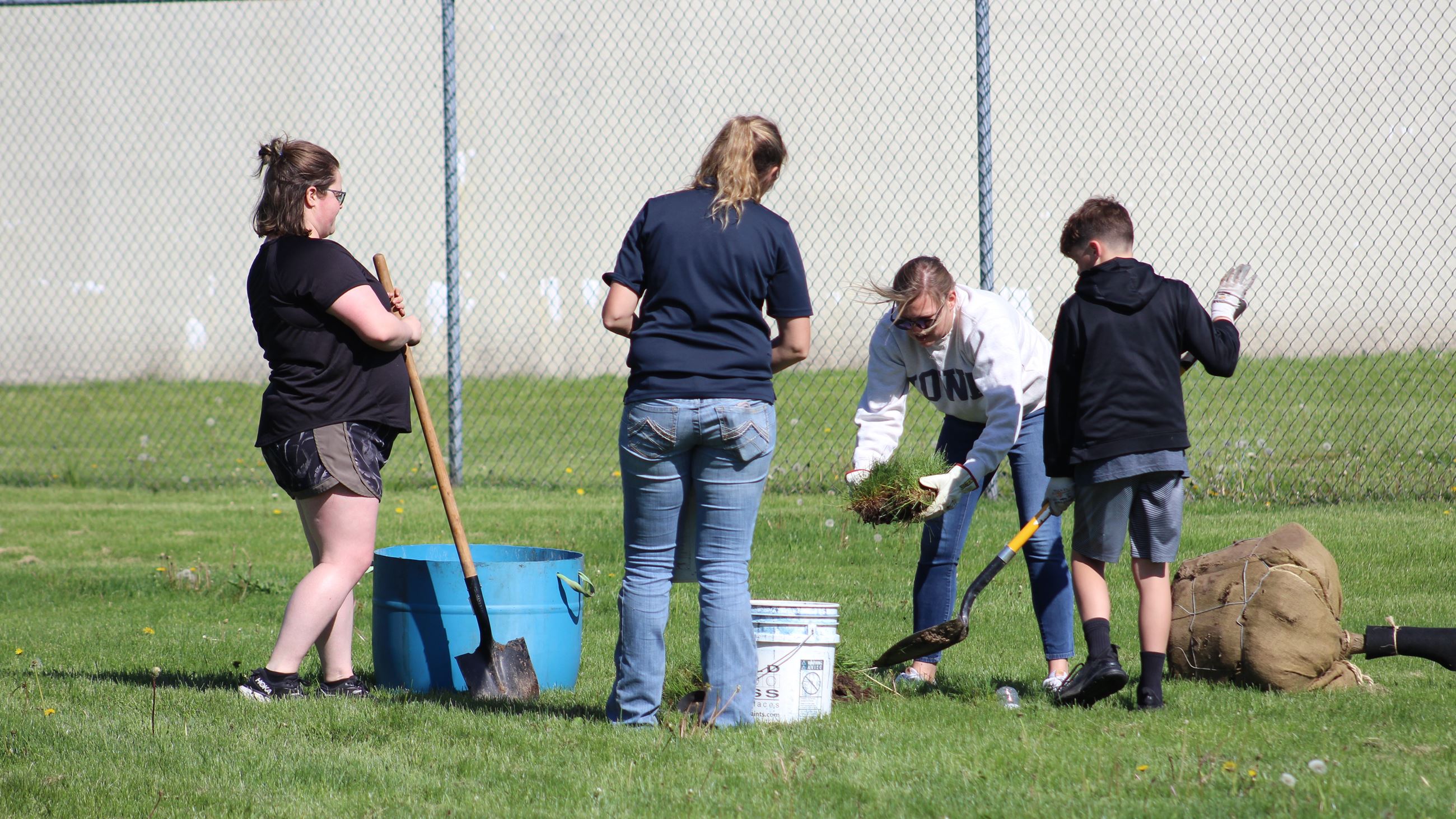 Lucas Park Tree Planting (JPG) volunteers digging  holes 05-03-24